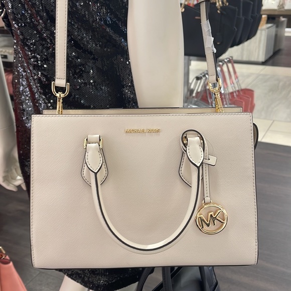 Michael Kors Sheila Medium Center Zip Satchel Crossbody Bag
Light Cream 
NWT - Picture 15 of 16